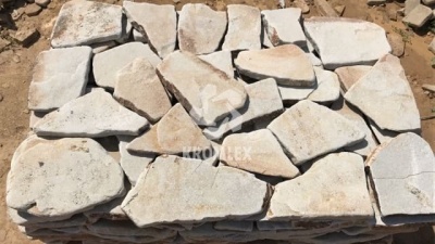 Песчаник белый галтованный